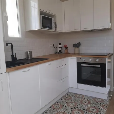 Апартаменты T3 Duplex Les Romarins *